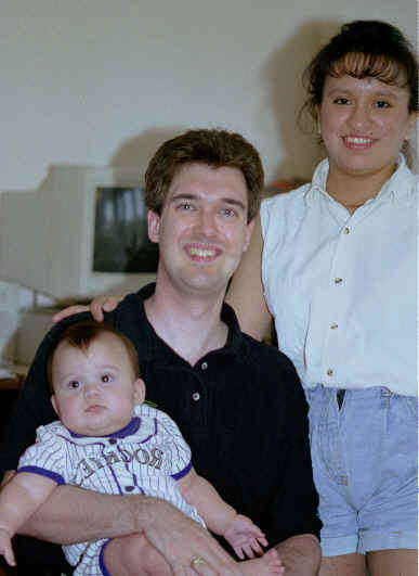 Tim his wife Tina and their son image.